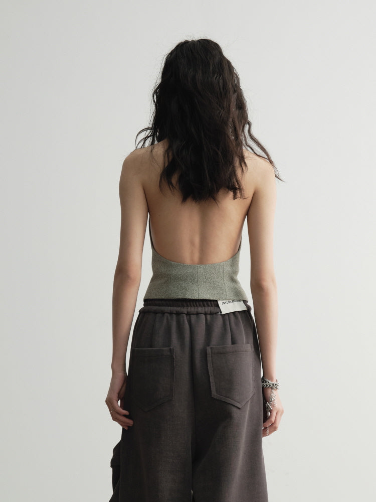 Scheming with a big backless inner halterneck vest