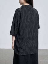 Niche embossed dark pattern shirt