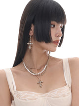 Multi-layered pearl cross necklace