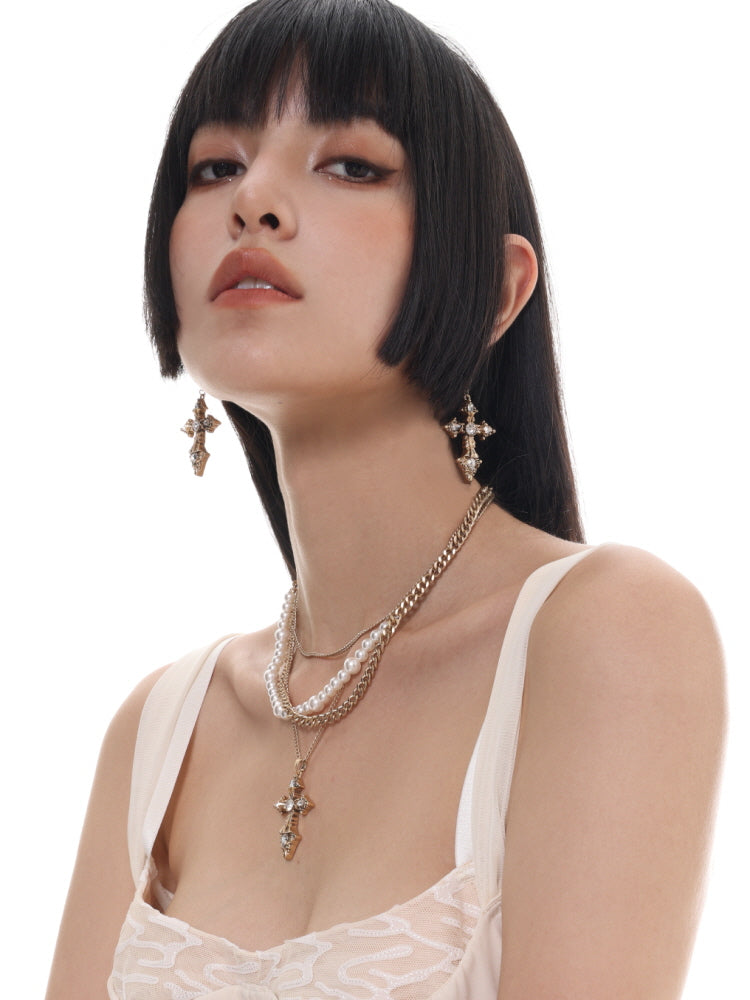 Multi-layered pearl cross necklace