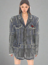 Distressed washed denim blazer with raw edges