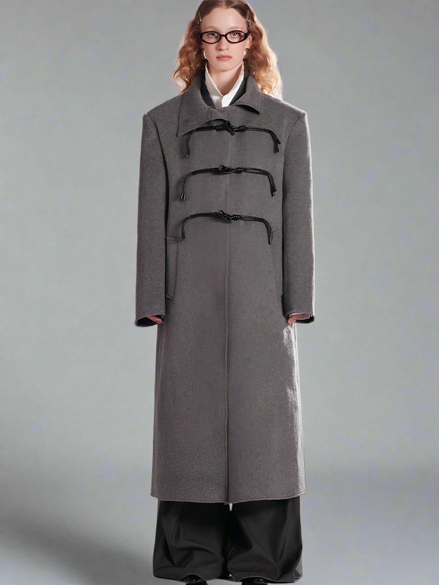 Asymmetrical horn button wool coat