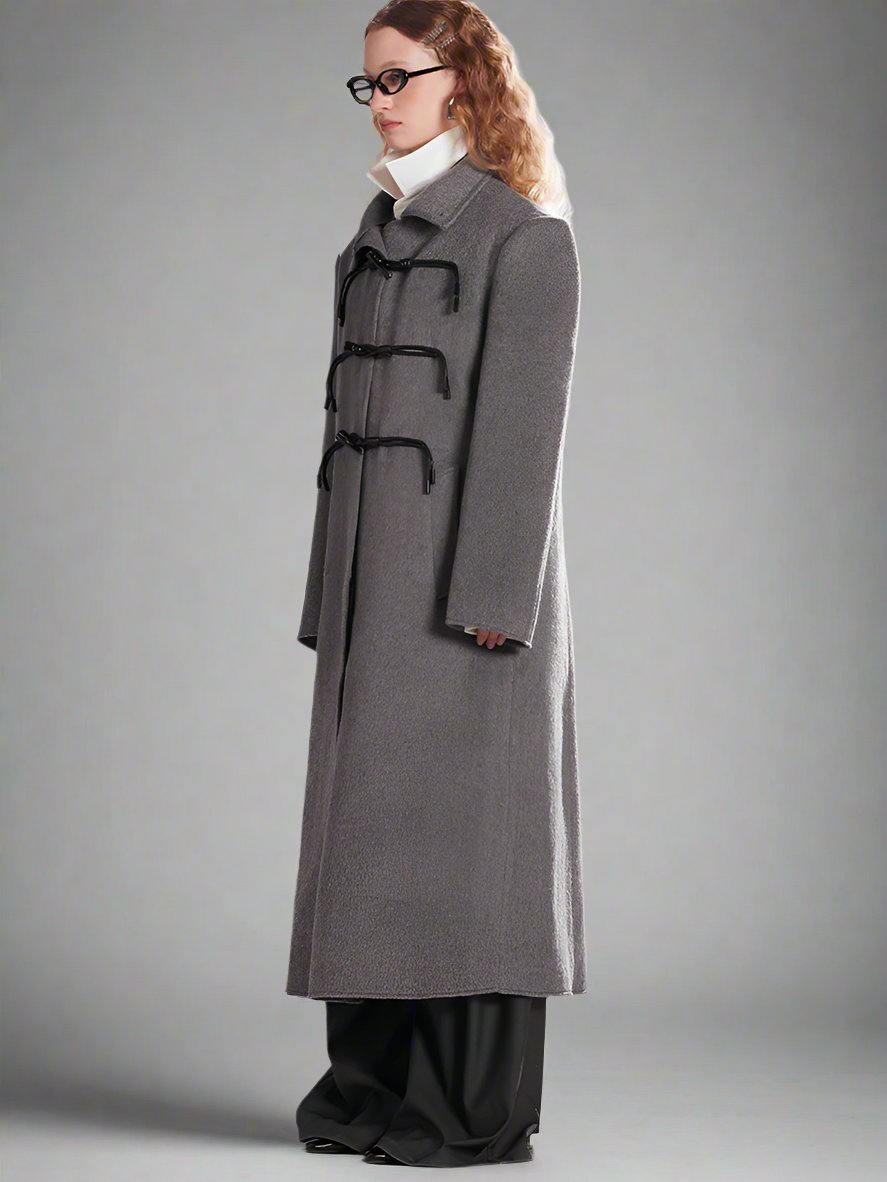 Asymmetrical horn button wool coat