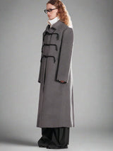 Asymmetrical horn button wool coat