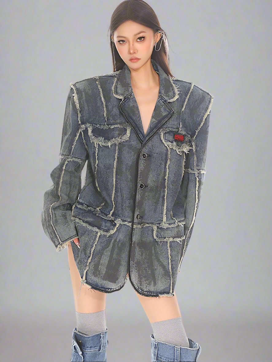 Distressed washed denim blazer with raw edges