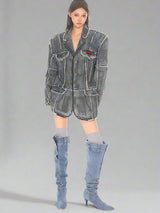 Distressed washed denim blazer with raw edges