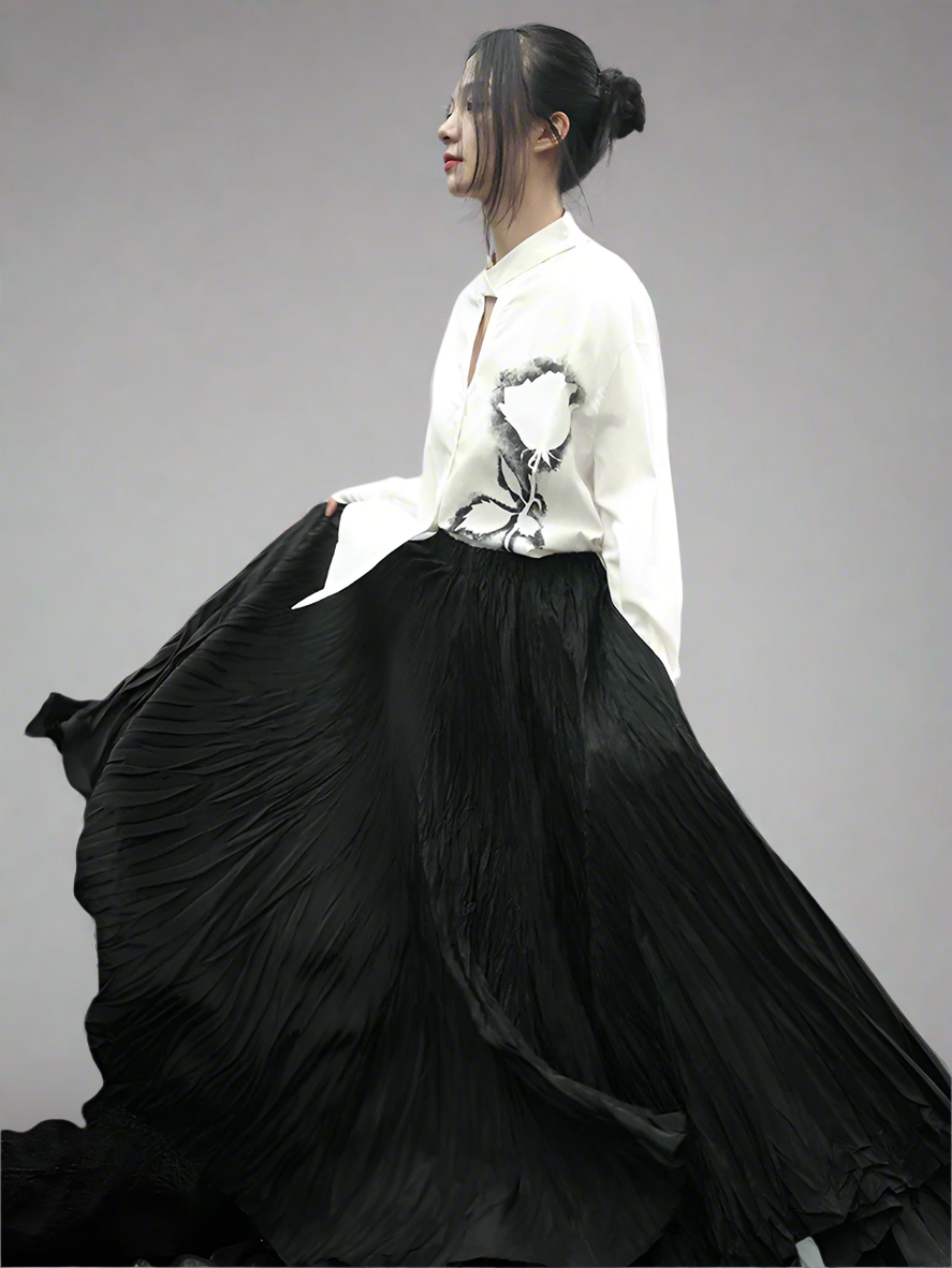 Pressed thin black pleated skirt