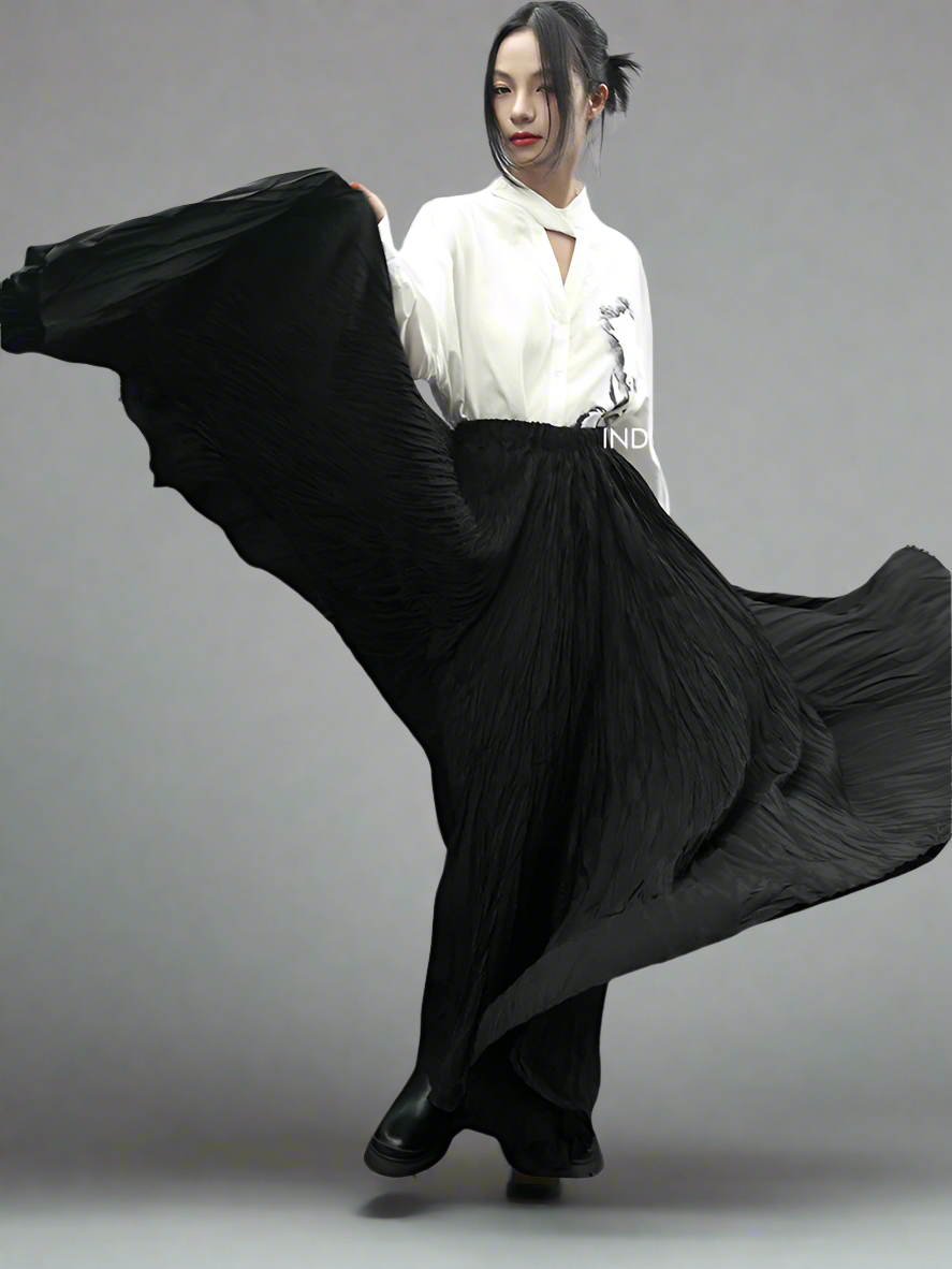 Pressed thin black pleated skirt