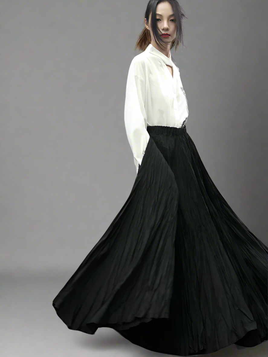 Pressed thin black pleated skirt